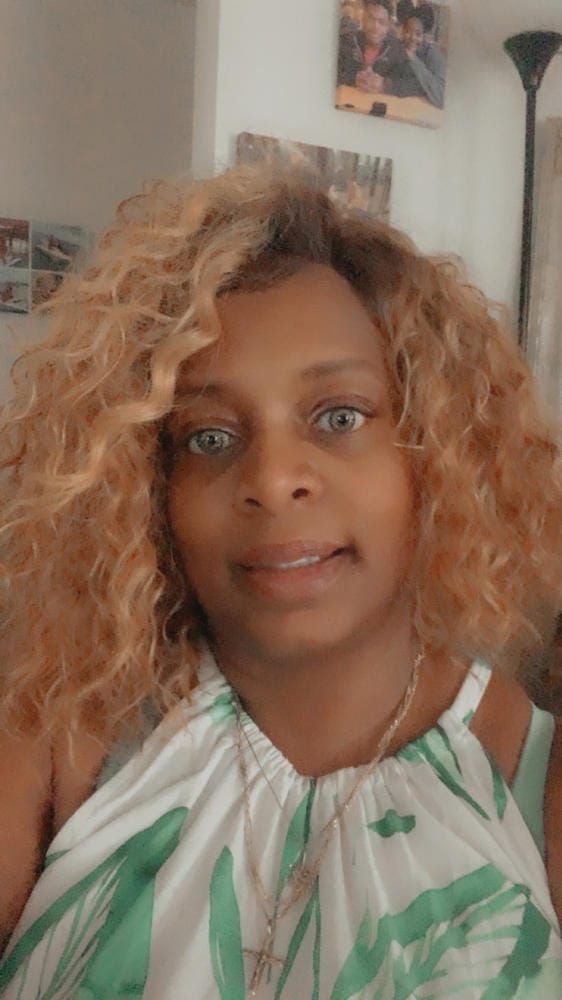 Customer photo review of Outre Synthetic Pre-Plucked HD Transparent Lace Front Wig- GRETA