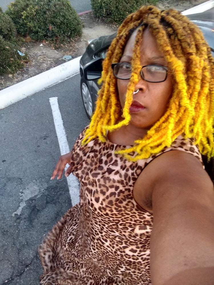 Customer photo review of Outre X-Pression Twisted Up Crochet Braid - 3X SPRINGY AFRO TWIST 16"
