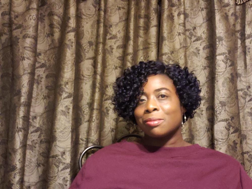 Customer photo review of Outre Big Beautiful Hair Drawstring Ponytail 4A KINKY KOILS 14"