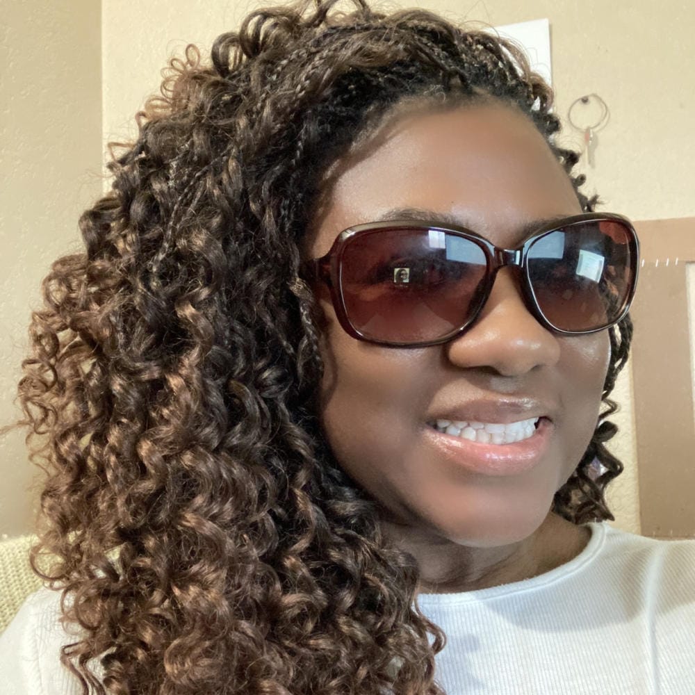 Customer photo review of Bobbi Boss Synthetic African Roots Crochet Braid BRAZILIAN DEEP WAVE 10 Inch