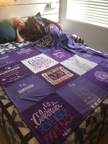 T-shirt quilt with cancer awareness, survivorship themes by Jan from CA