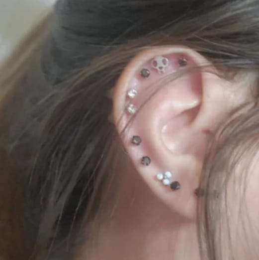 Customer photo review of Cat Skull Silhouette Nose Stud + Earring