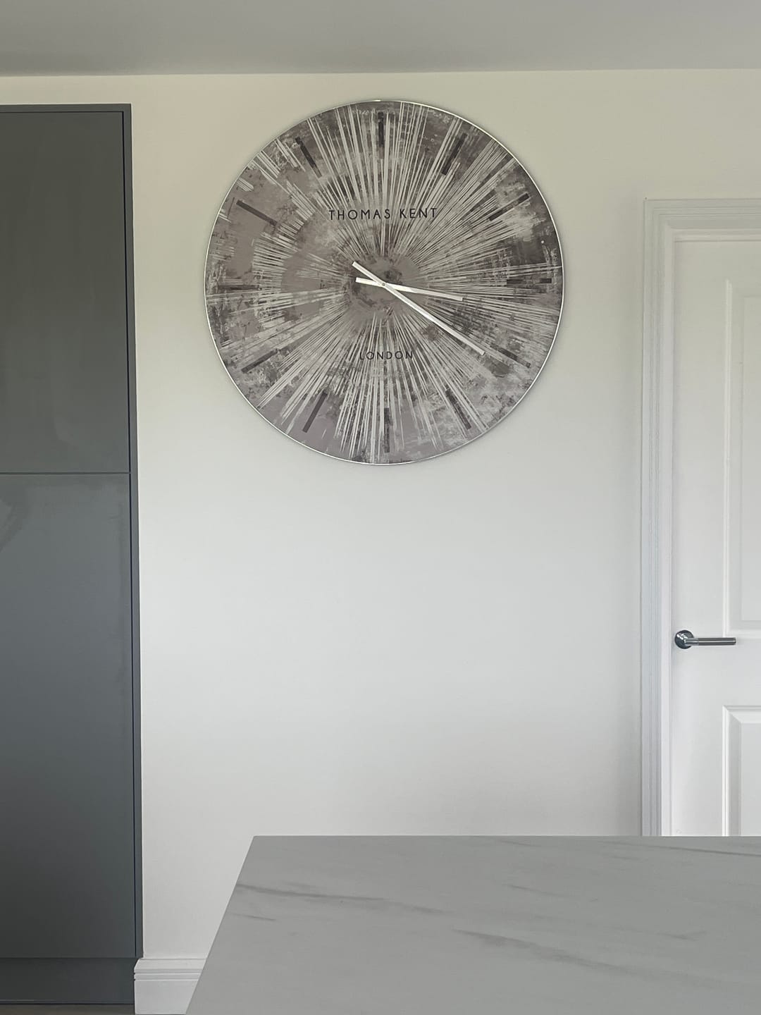Customer photo review of Thomas Kent London. Starburst Wall Clock 36" (92cm) Silver