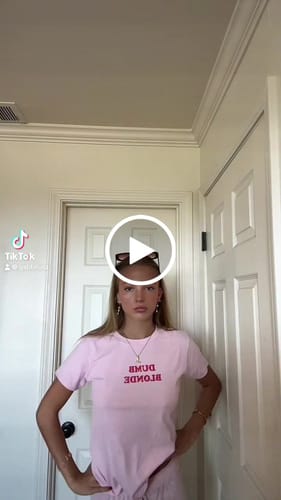 Customer video review of 'Dumb Blonde' baby tee