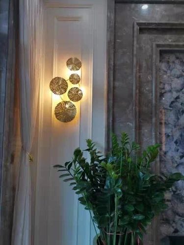 Customer photo review of Applique murale cuivre doré - Fleur de lotus