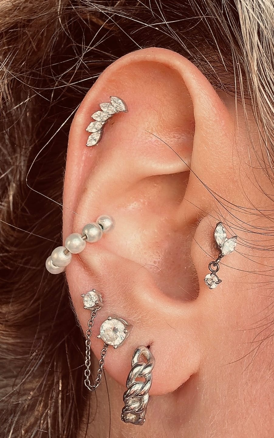 Customer photo review of Feather Piercing | Titan