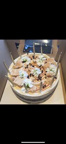 Customer photo review of chocolate caramel cake
