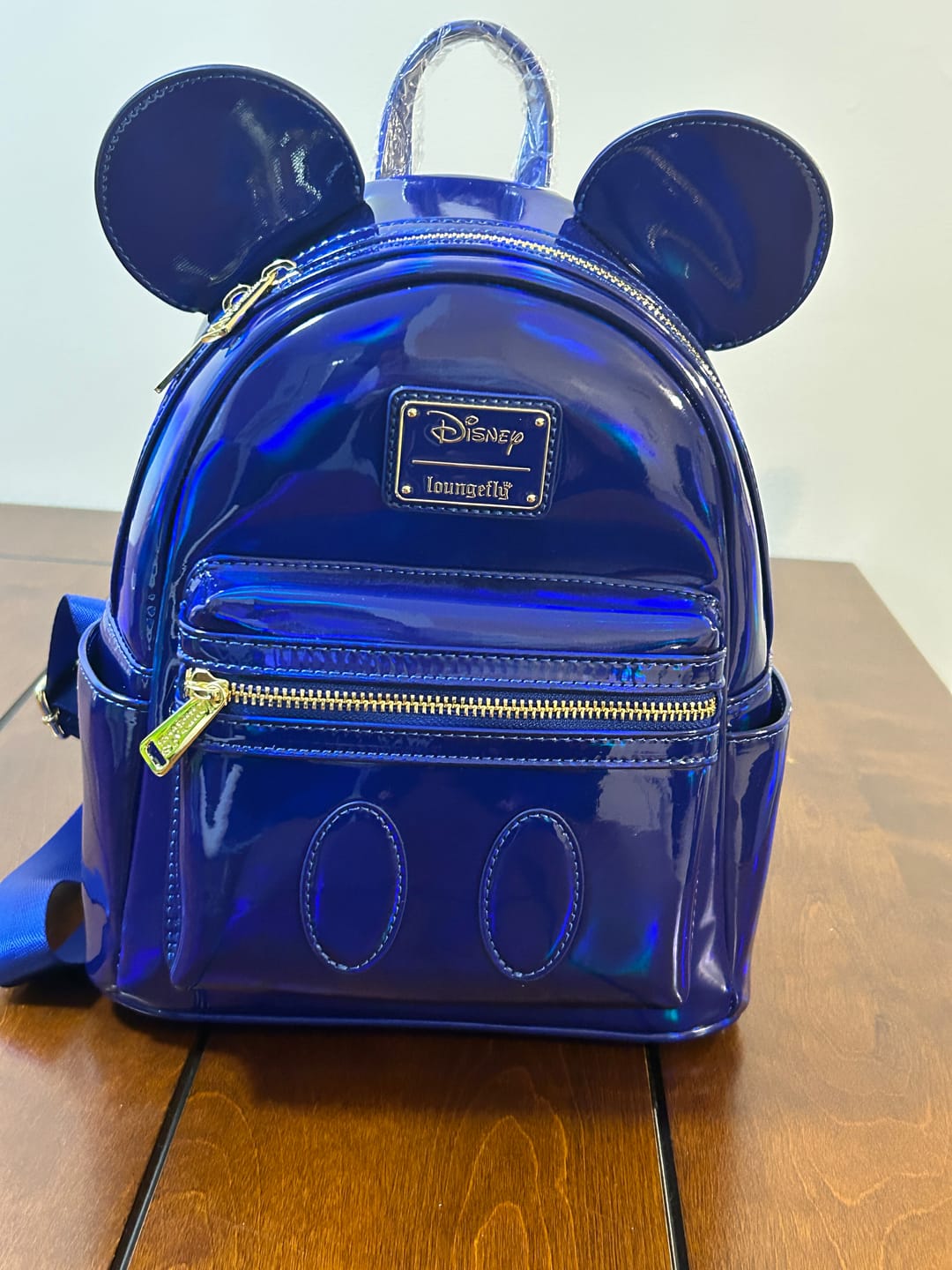 Customer photo review of Loungefly Disney Mickey Mouse Holographic Series Mini Backpack: Sapphire - 707 Street Exclusive