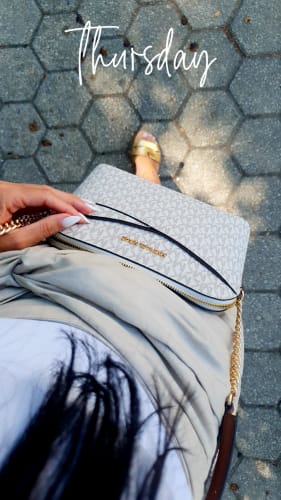 Customer photo review of Jet Set Travel Medium Logo Dome Crossbody Bag (VANILLA)