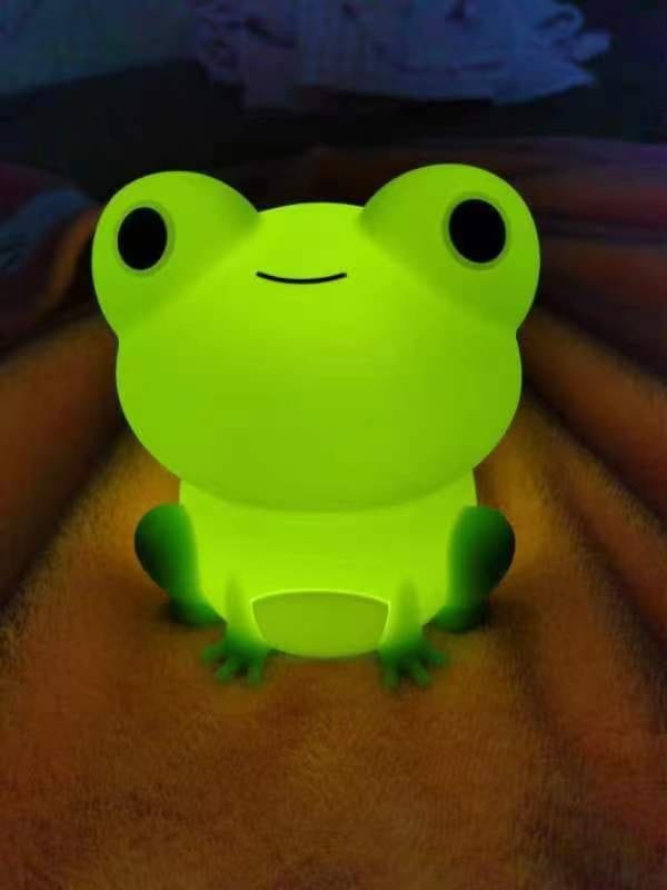 Customer photo review of Huggwaii Squishy Silicone Peculiar Frog LED Night Light - Perfect Gift for Kids and Girls