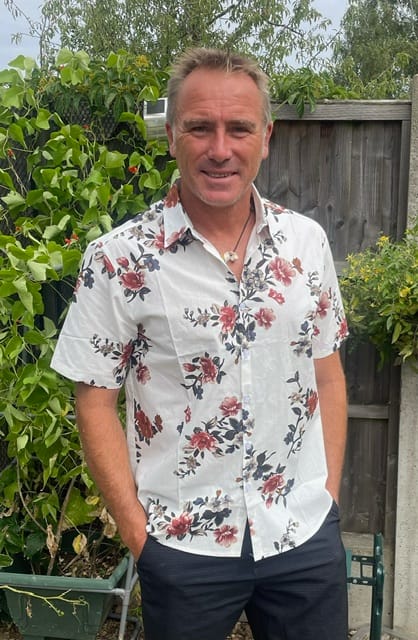 Customer photo review of Men's Cotton Floral Casual Flower Print Hawaiian Button Up Beach Short Sleeve Shirt