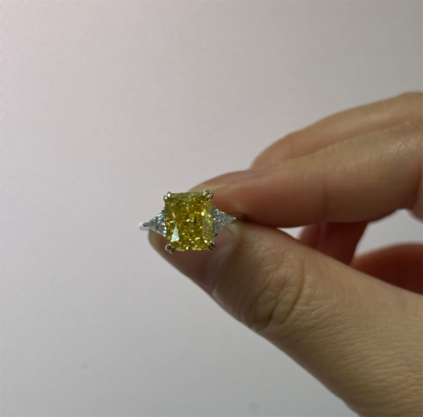 Customer photo review of S925 4.0Ct Radiant & Triangle Cut Yellow Stone Three Stone Engagement Ring In Sterling Silver