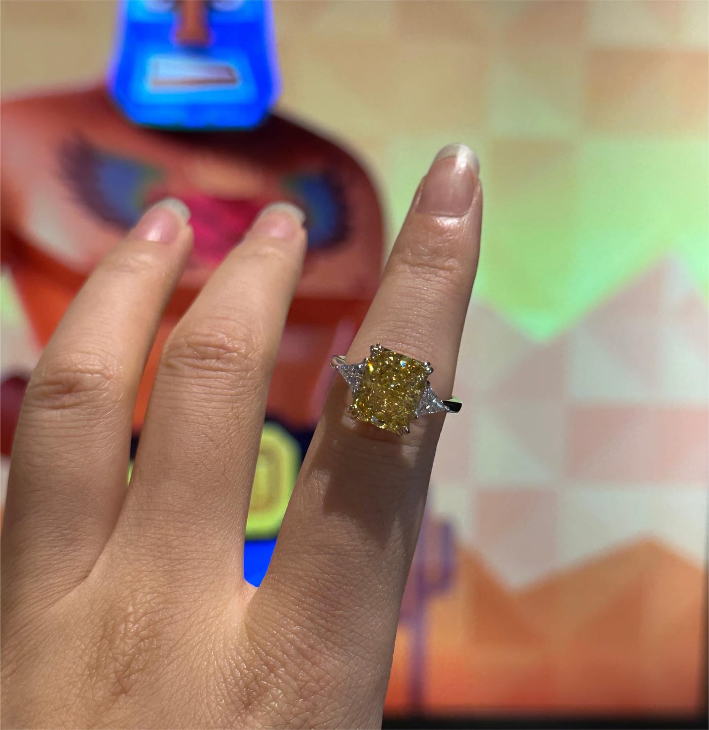 Customer photo review of S925 4.0Ct Radiant & Triangle Cut Yellow Stone Three Stone Engagement Ring In Sterling Silver
