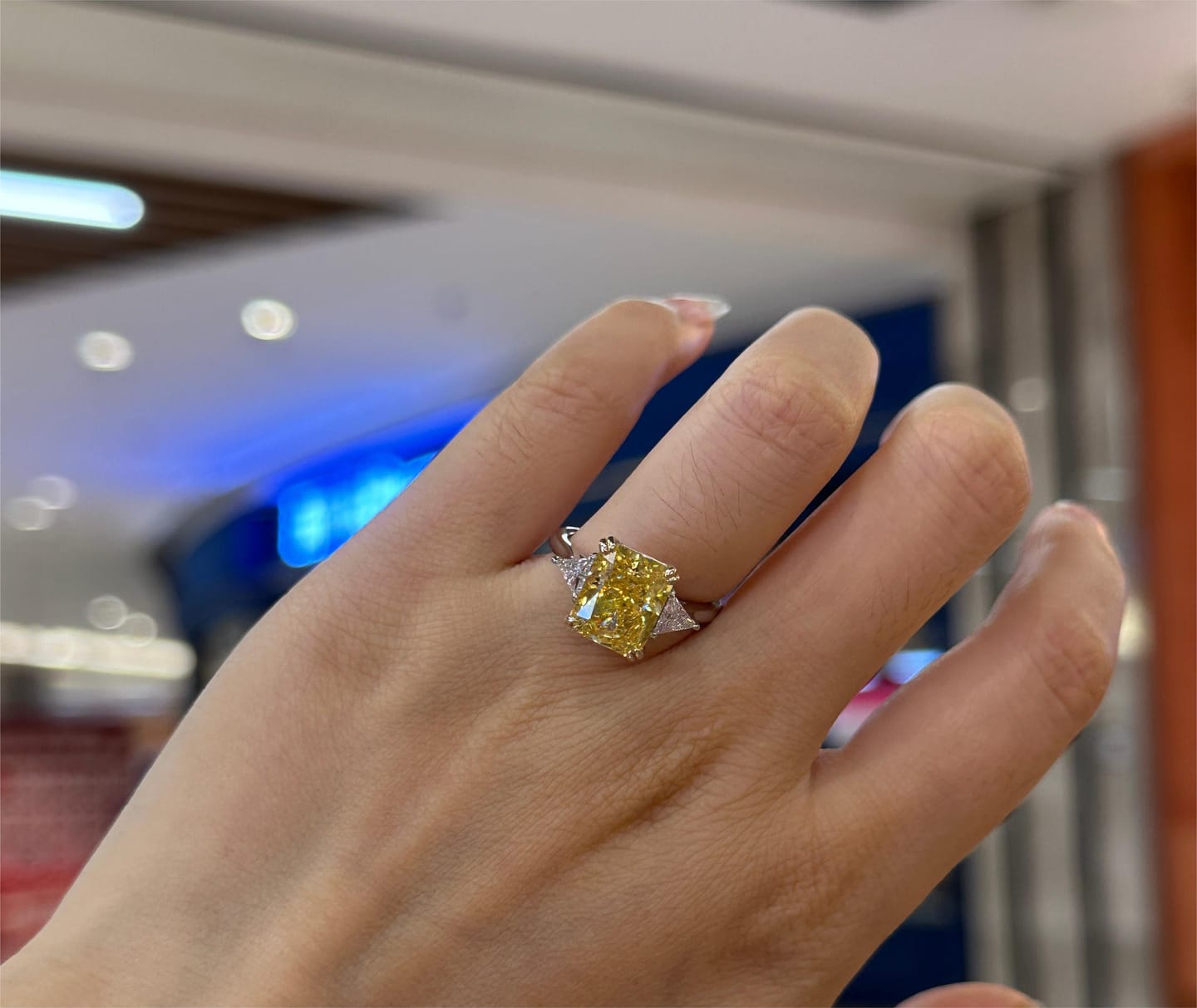 Customer photo review of S925 4.0Ct Radiant & Triangle Cut Yellow Stone Three Stone Engagement Ring In Sterling Silver
