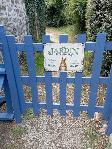 Customer photo review of Pancarte personnalisée - Avoir un beau jardin, c'est déjà vivre dans son paradis.