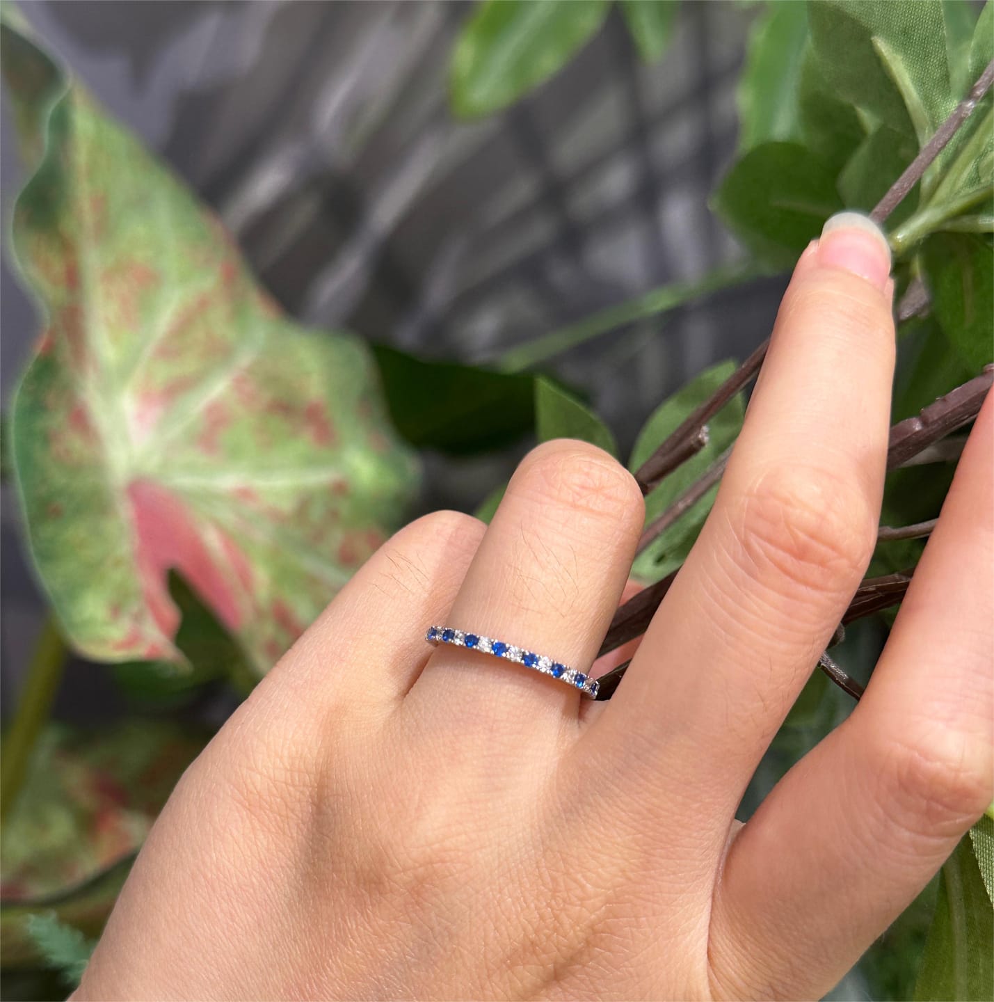 Customer photo review of Louily 0.3 CT Round Cut Half Eternity Blue And White Sapphire Wedding Band For Women In Sterling Silver