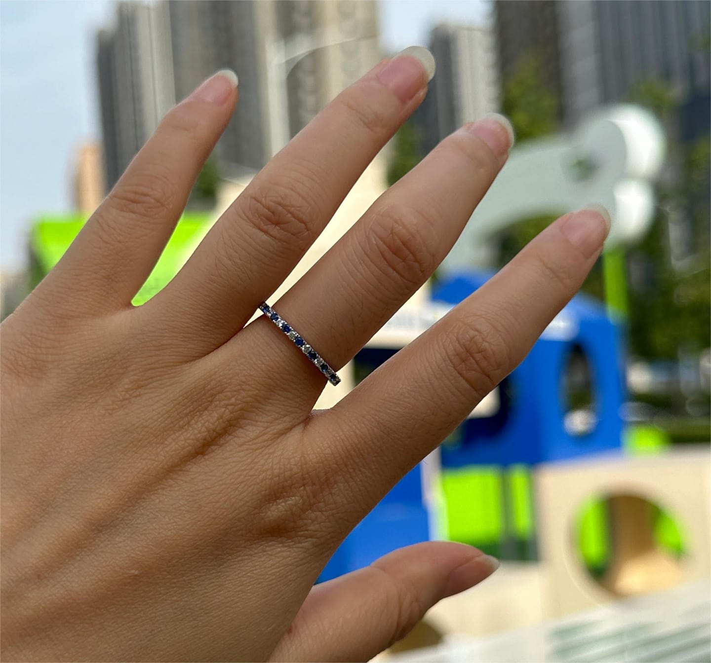 Customer photo review of Louily 0.3 CT Round Cut Half Eternity Blue And White Sapphire Wedding Band For Women In Sterling Silver