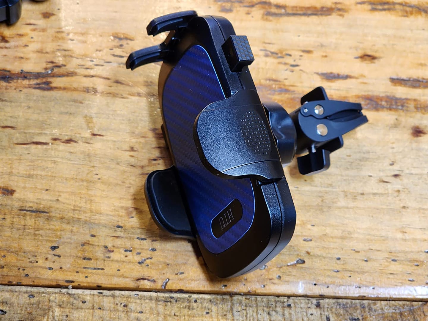 Customer photo review of Support de Téléphone Rotatif Premium pour Voiture