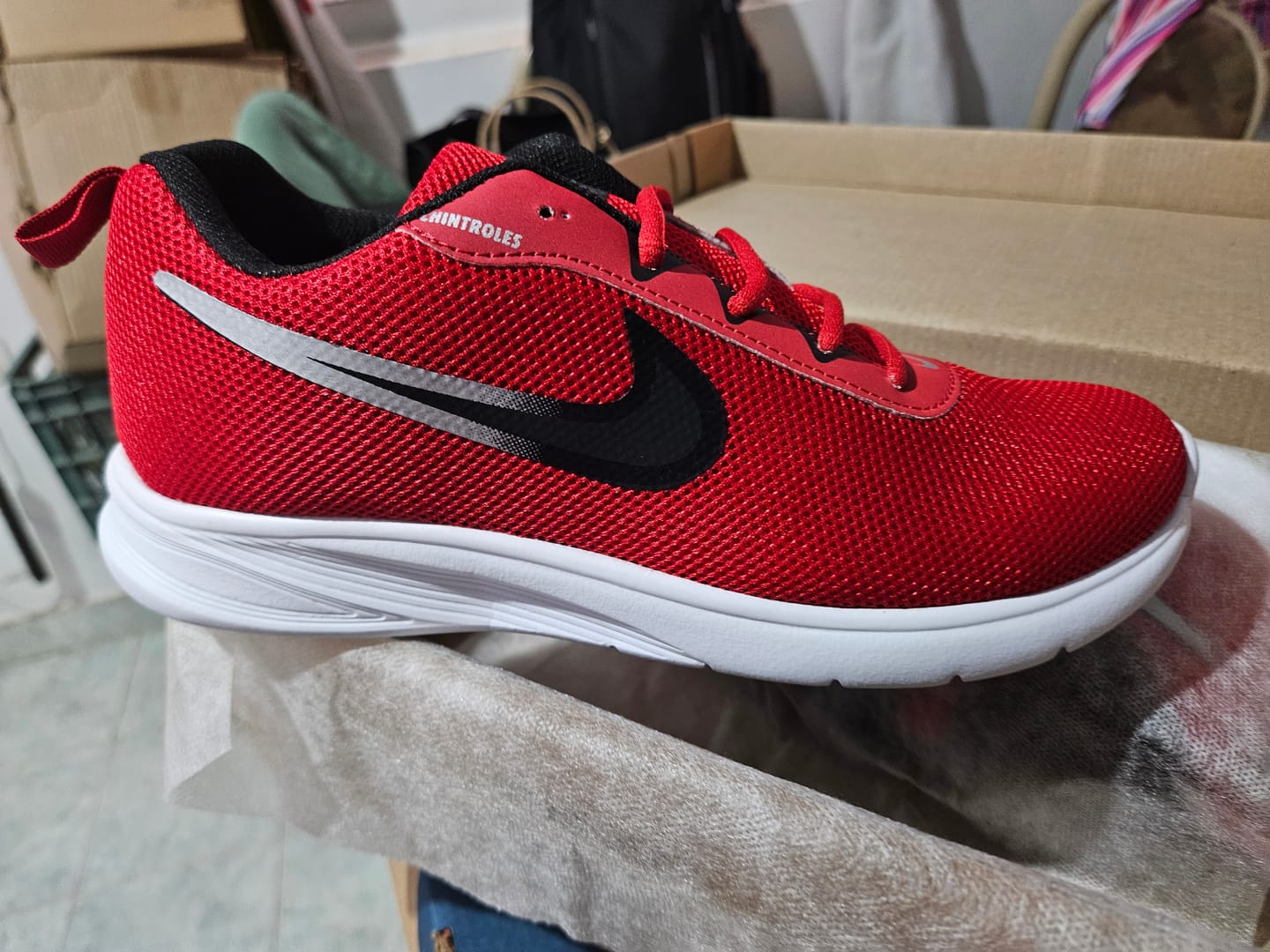 Customer photo review of Tenis 025 Rojo Negro Plata