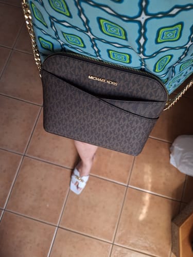 Customer photo review of Jet Set Travel Medium Logo Dome Crossbody Bag (BROWN)