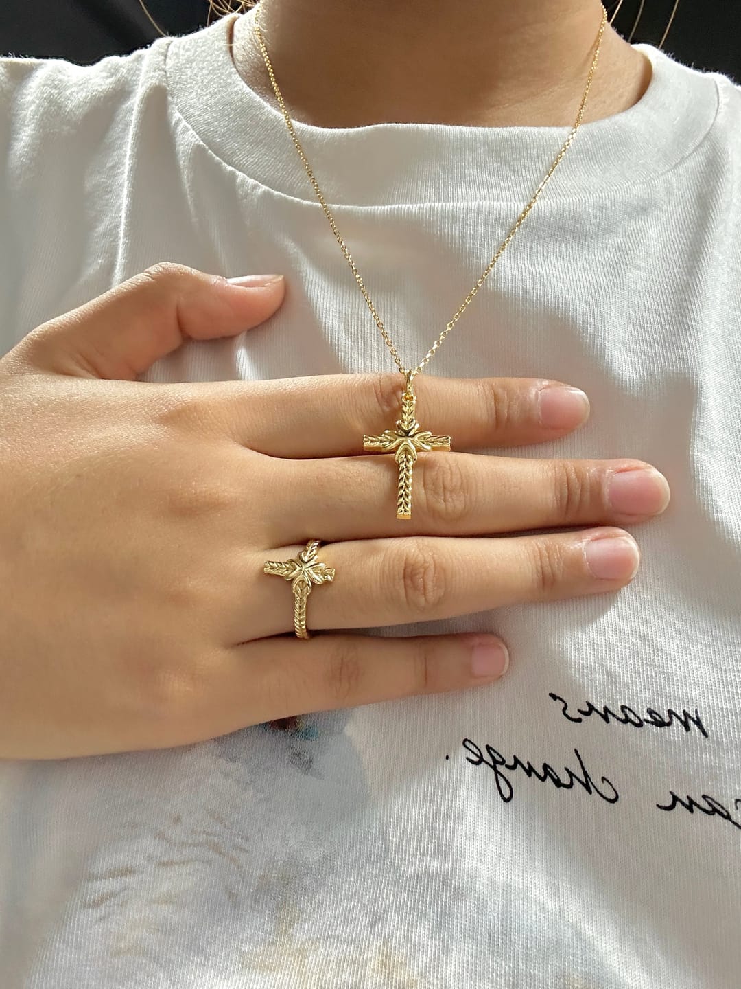 Customer photo review of Bread of Life Cross Necklace