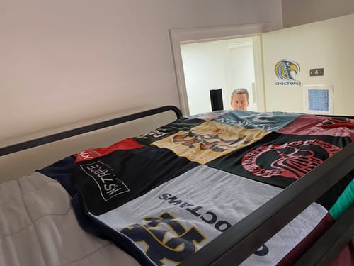 T-shirt quilt with sports, youth activities themes by Kim from AL