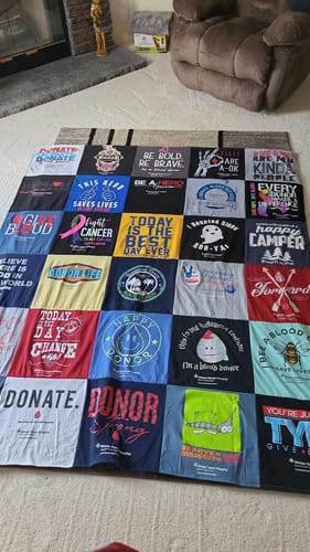 T-shirt quilt with philanthropy, health awareness themes by Barbara from FL