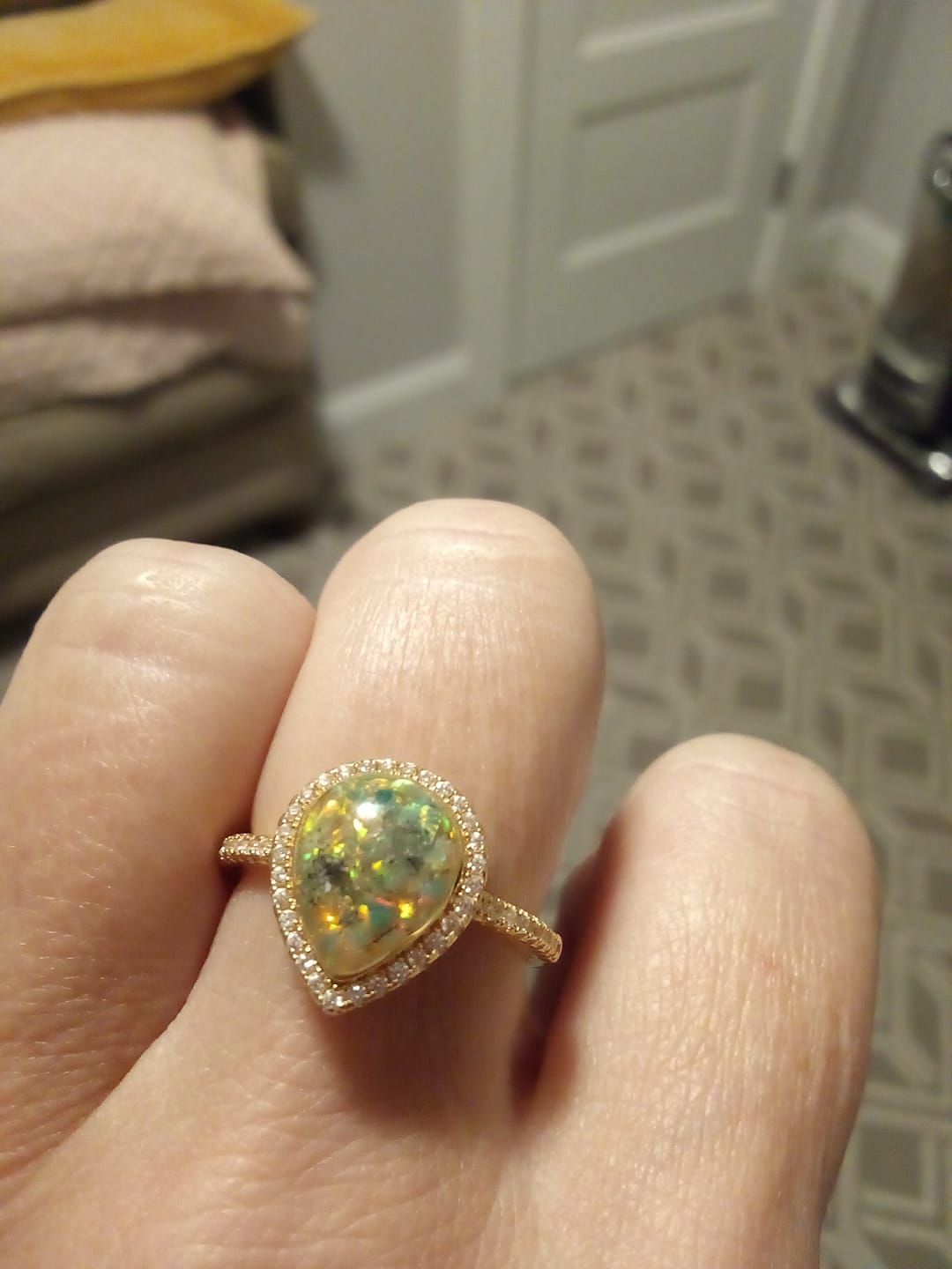 Customer photo review of Bedazzled Pear Opal Ring with Cremation Ashes