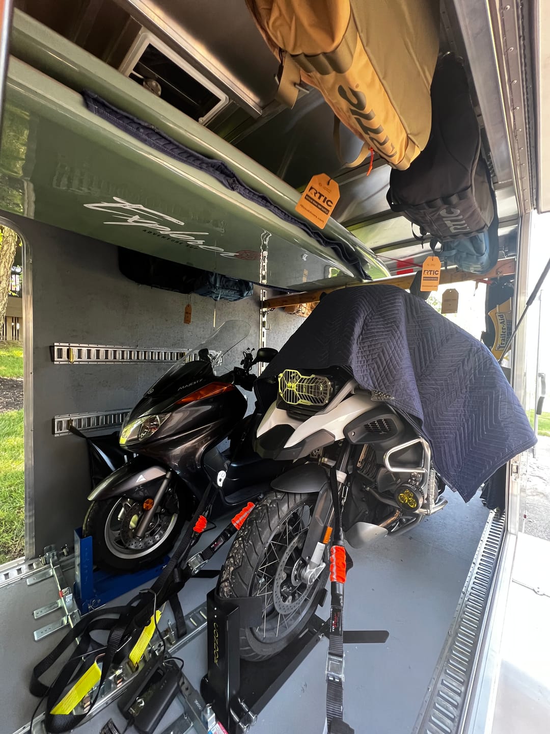 Customer photo review of TorkStrap HD750 | 14'x1.5'' Spring Loaded Tie Down Straps - Adapts to Load Shifts - Heavy Duty 2250lbs Max Load - Just Pull Alternative to Ratchet Straps w/Hooks - Secure Motorcycles, Kayaks