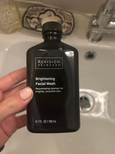 Customer photo review of Revision Skincare Brightening Facial Wash by Grace M.
