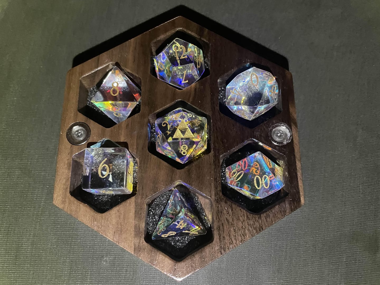Customer photo review of URWizards D&D Dichroic Prism Glass Gemstone Engraved Dice Set Triforce