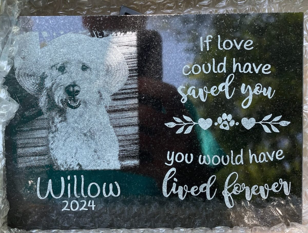 Customer photo review of Outdoor Personalized Dog Memorial Plaque Black Granite keepsake stone