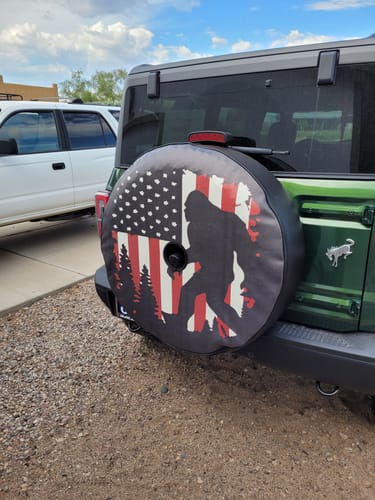 Customer photo review of Bigfoot or Sasquatch American Flag Spare Tire Cover for Bronco, Jeep, Camper, RV, & More