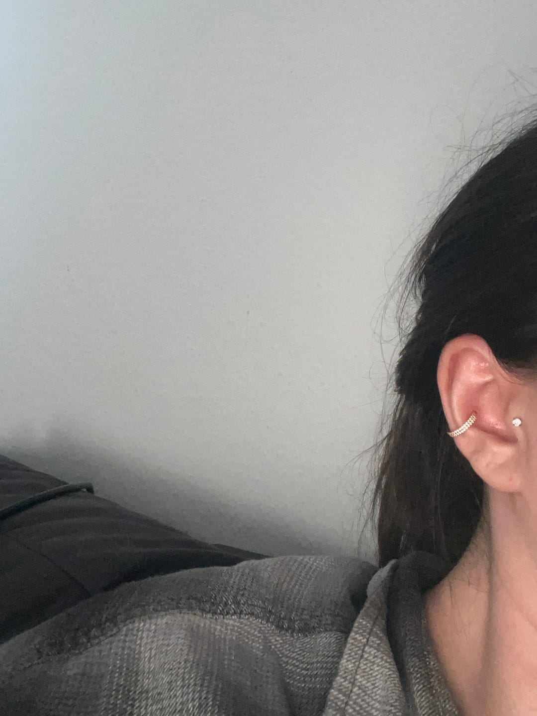 Customer photo review of Double Conch Piercing | Titan