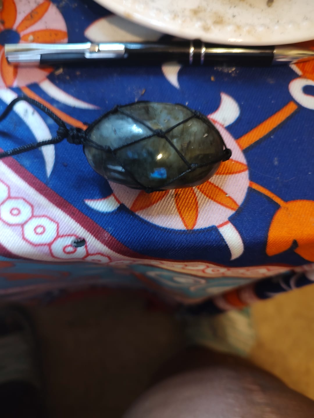 Customer photo review of Dragon's Heart Labradorite Necklace