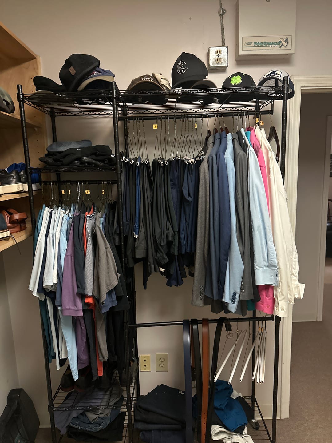 Customer photo review of Raybee Heavy Duty Portable Clothes Rack With Wheels,Clothing Rack For Hanging,Garment Rack For Bedroom