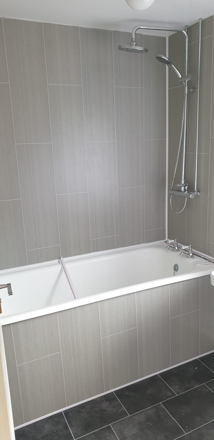 Customer photo review of 8mm Seagrass Large Tile Effect Bathroom Wall Panel 2.6M