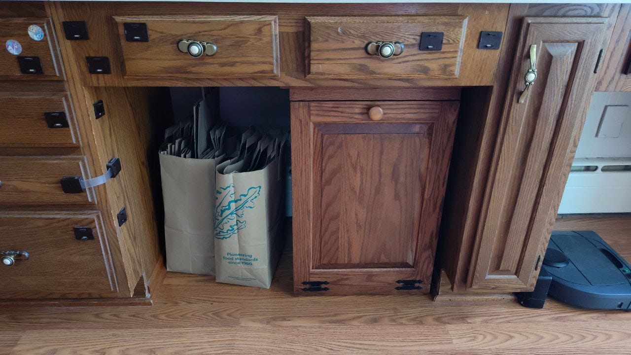 Customer photo review of Solid Oak Hideaway Pull Out Garbage Cabinet