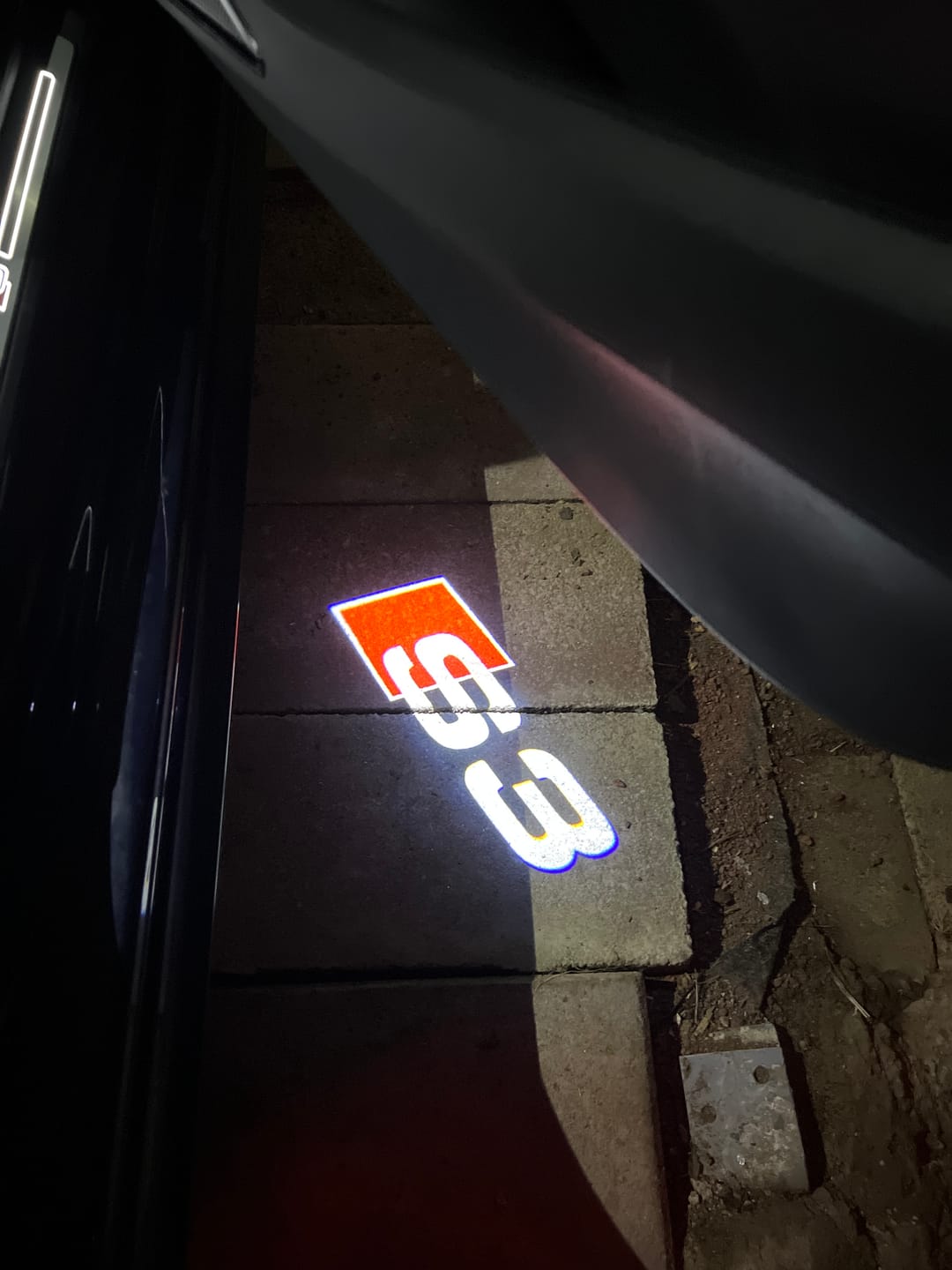 Customer photo review of EuroLuxe Audi LED Car Door Puddle Welcome Logo Shadow Lights