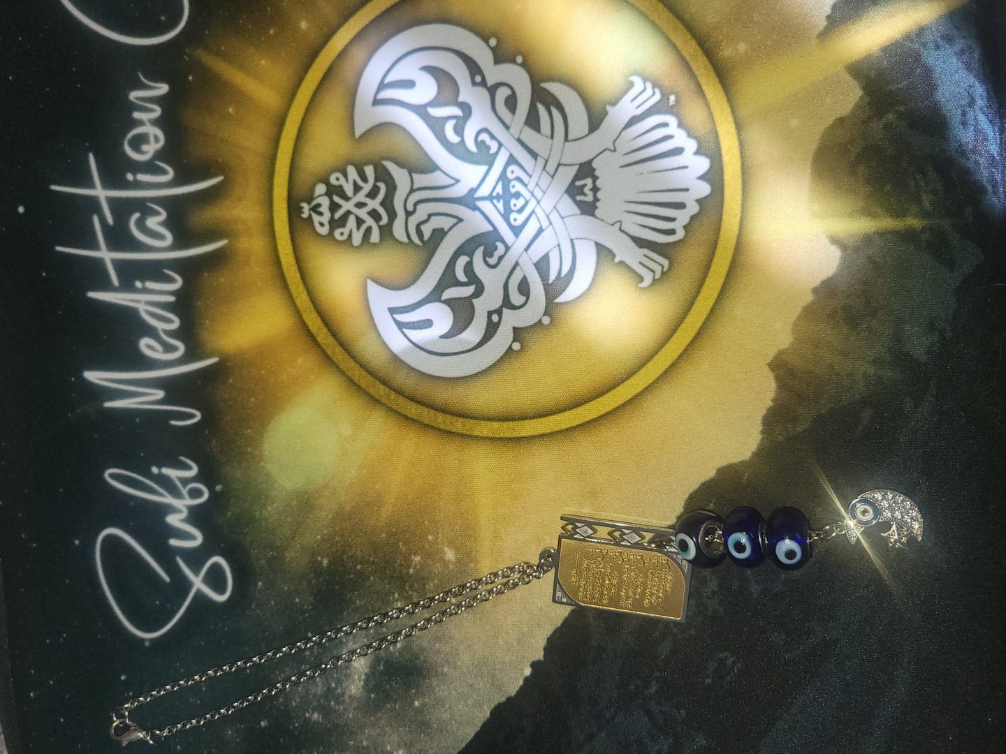 Customer photo review of Evil Eye Four Qul Suras Quran Crescent Moon Star Amulet Car Rear View