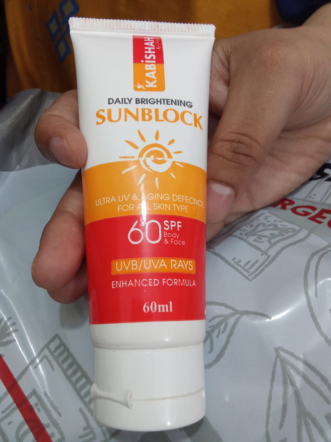 Customer photo review of LuminaGuard Daily Brightening Sunblock