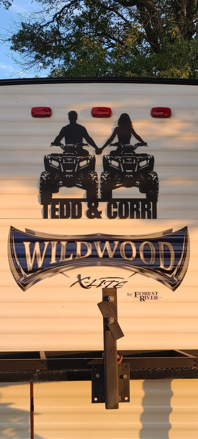 Customer photo review of Custom Couples who Off-Road Metal Sign