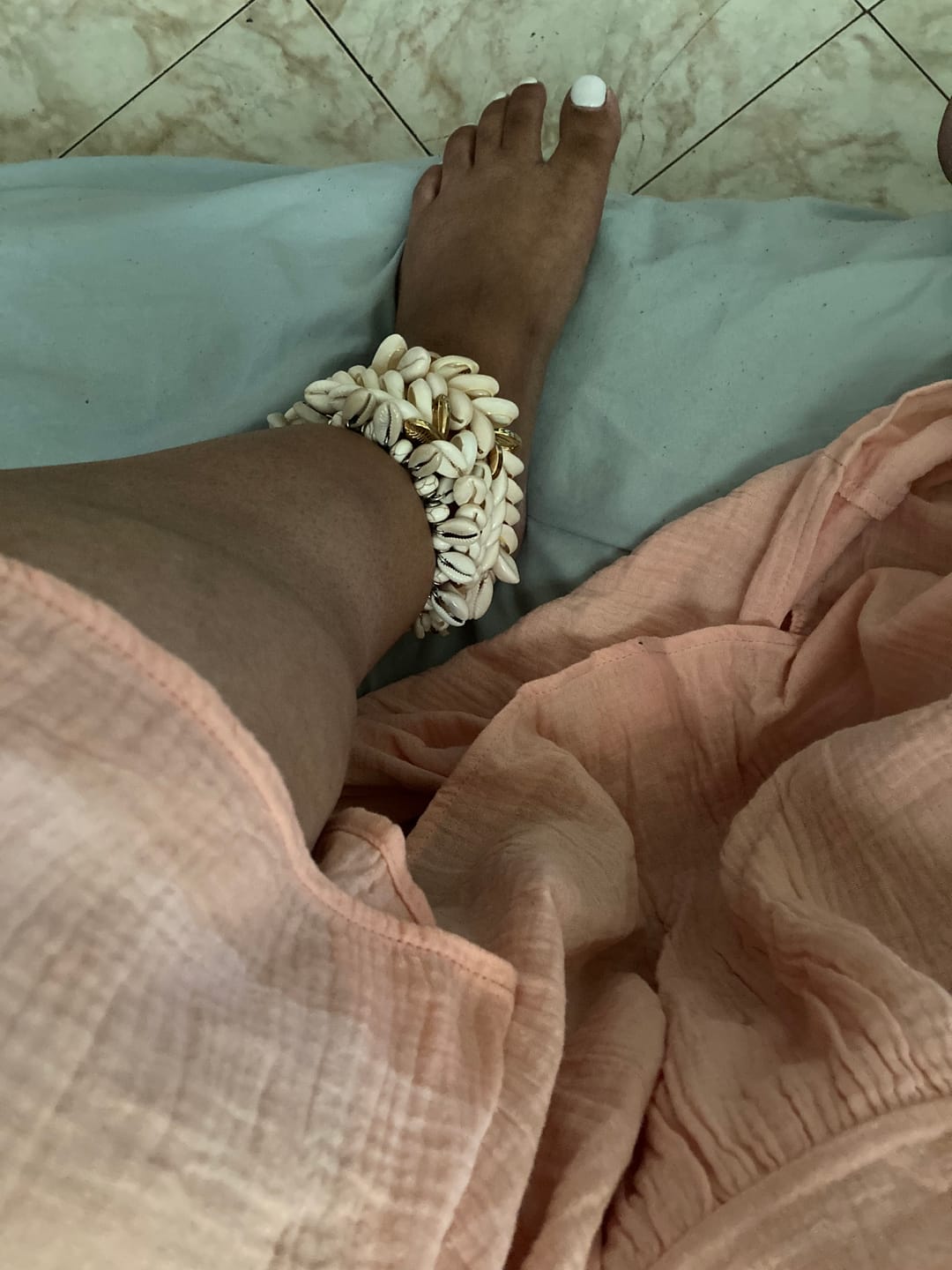 Customer photo review of Cowry cluster bracelet/anklet