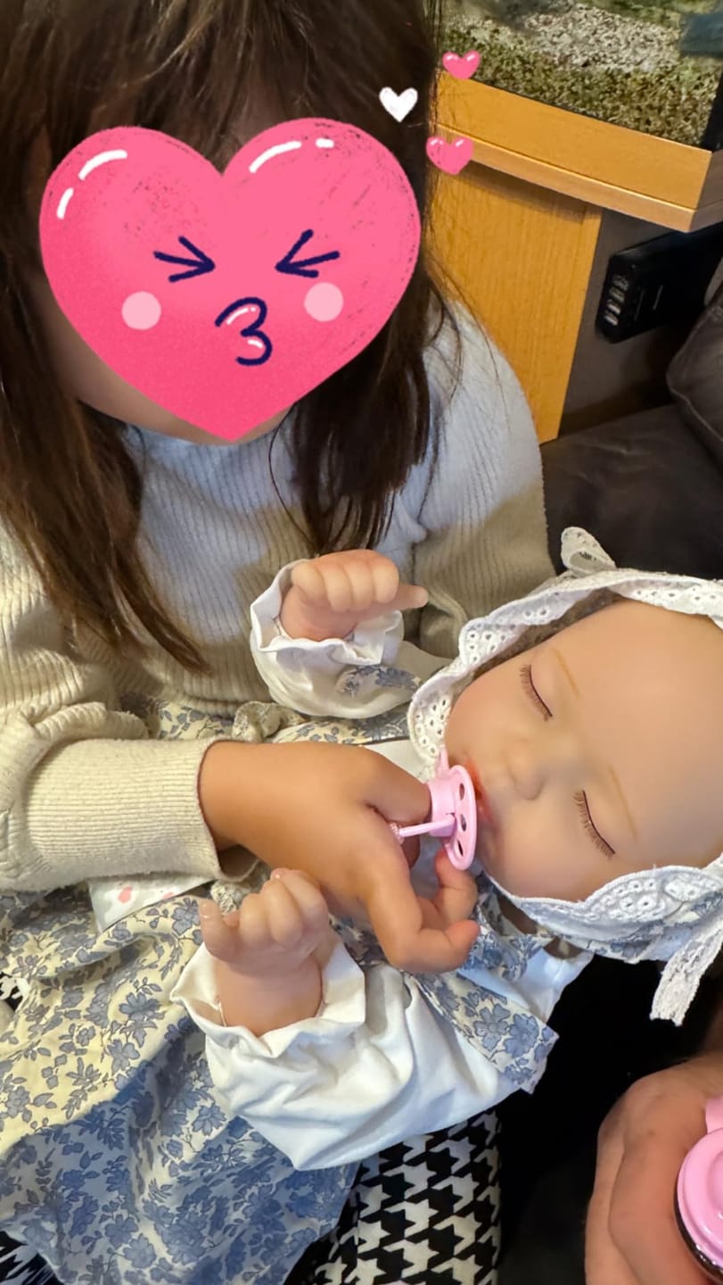 Customer photo review of Evelyn -  Lifelike Sleeping Reborn Baby Doll (18")