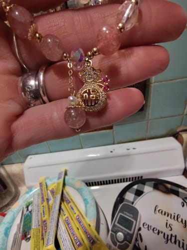 Customer photo review of FREE Today: Love Healing Natural Strawberry Quartz Crystal Money Bag Charm Positive Bracelet
