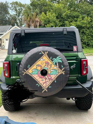 Customer photo review of Girl Riding Flamingo at the Beach Funny Spare Tire Cover for Jeep, RV, Bronco, Camper, & More