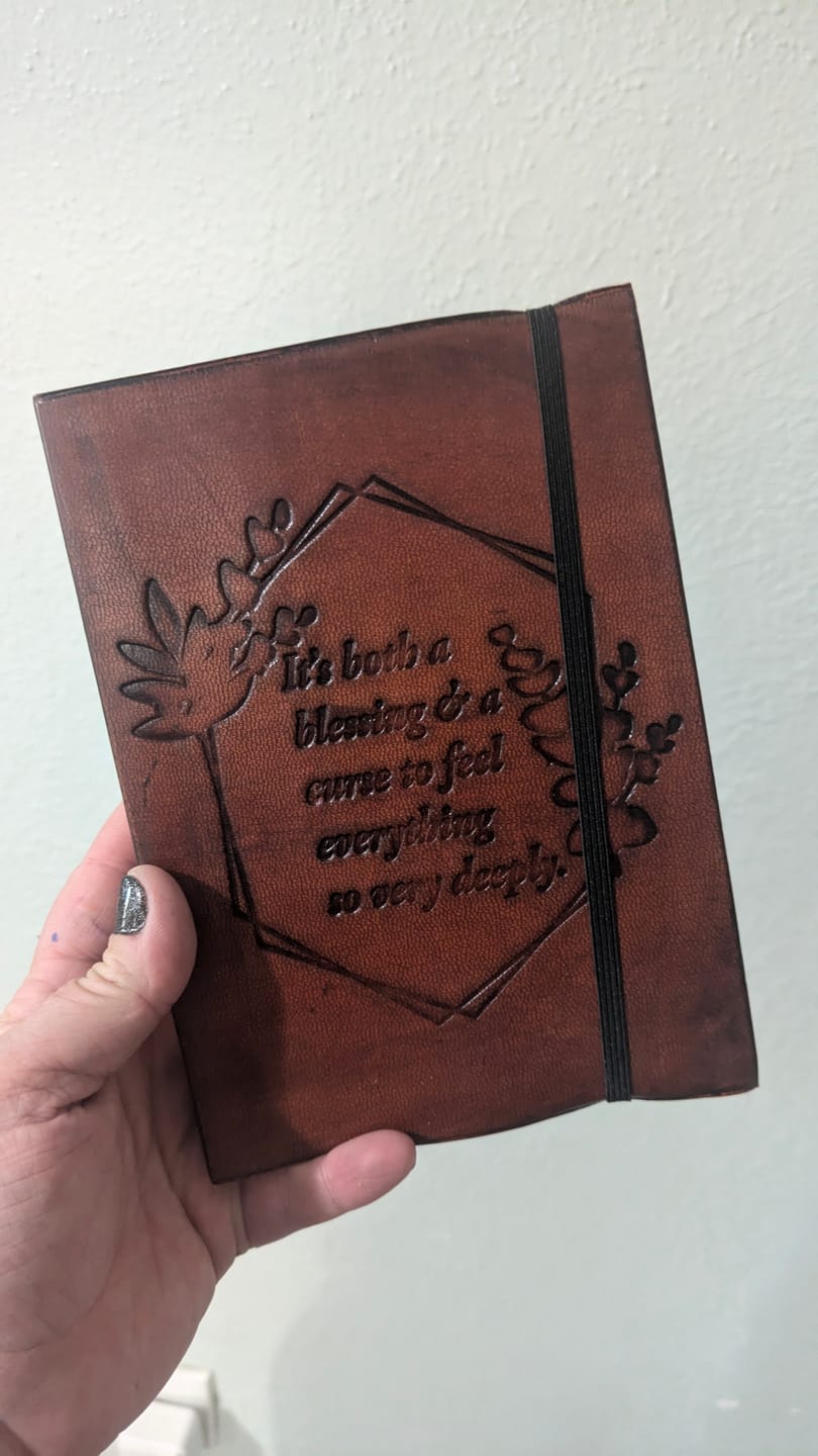 Customer photo review of Feel Deeply Quote Leather Journal - 7x5