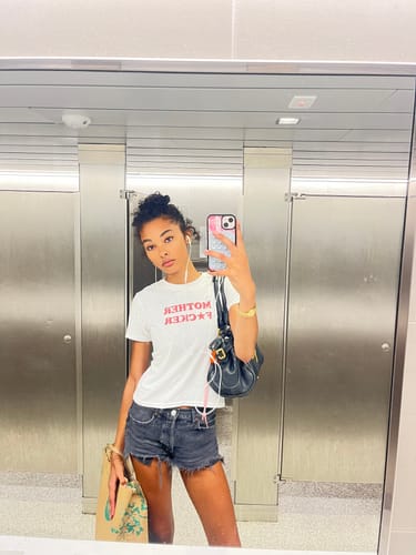 Customer photo review of 'Mother F★cker' baby tee