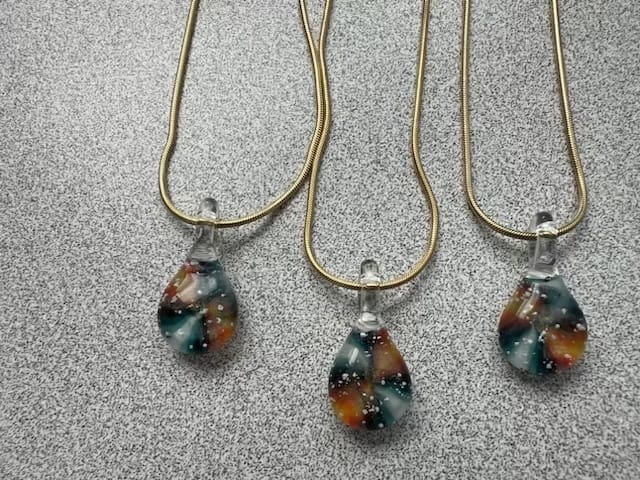 Customer photo review of Tie Dye Pendant with Infused Cremation Ashes