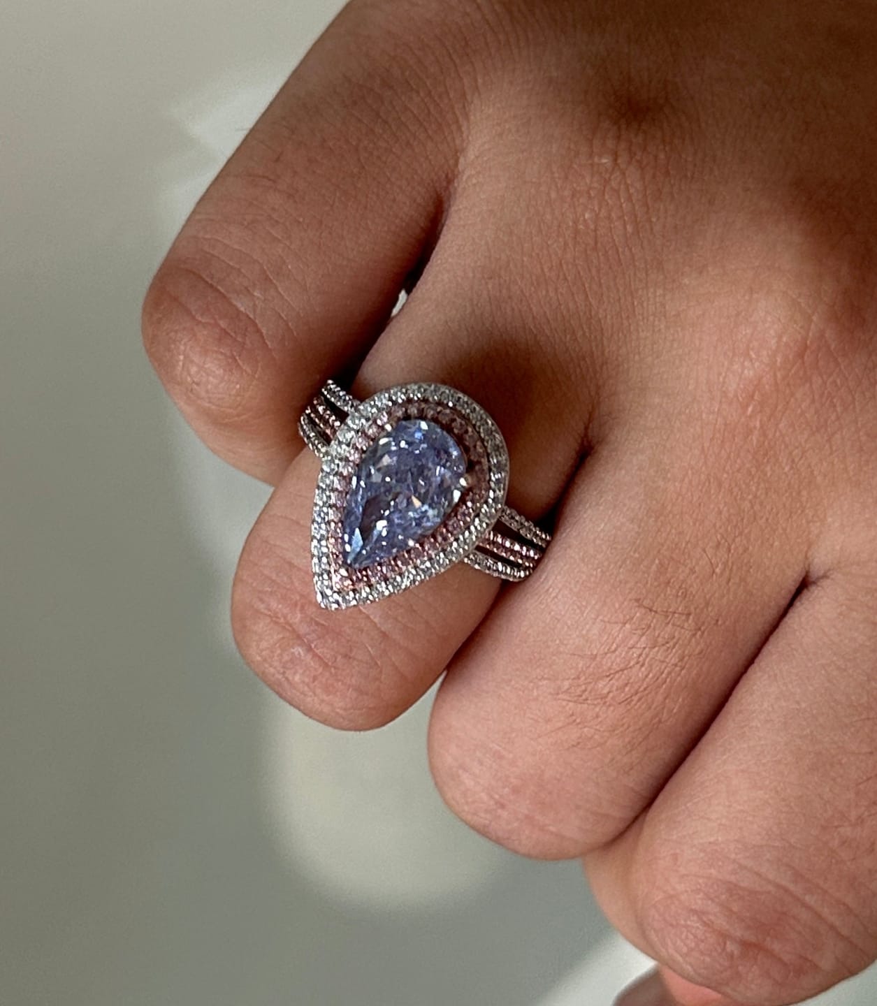 Customer photo review of Louily Luxurious Double Halo Pear Cut Aquamarine Blue/Purple Engagement Ring In Sterling Silver